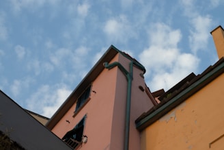concrete building with gutter