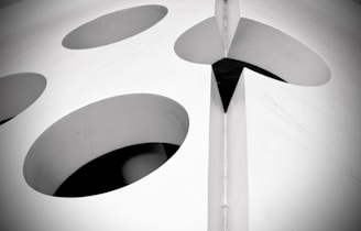 Black and white image of a modern art piece combining graphic and audiovisual elements.