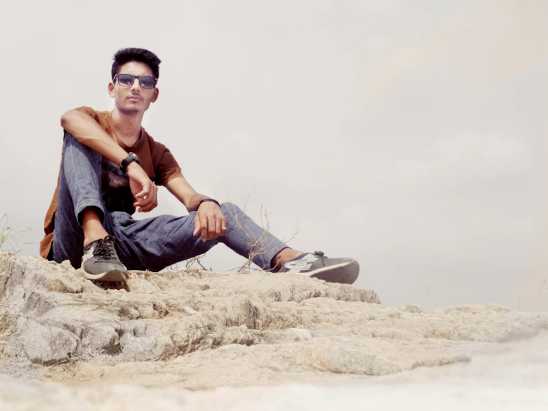 man sitting on ground