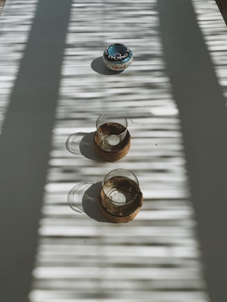 Peaceful morning scene with religious items displayed softly on a wooden table, inviting calm and devotion