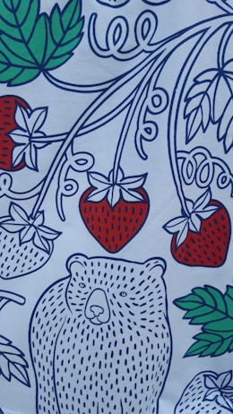A stylized illustration featuring a white bear with dotted blue patterns on its body, surrounded by large strawberries with red and green colors, and green leaves. The design has swirling blue lines interconnecting the elements, creating a playful and decorative appearance.