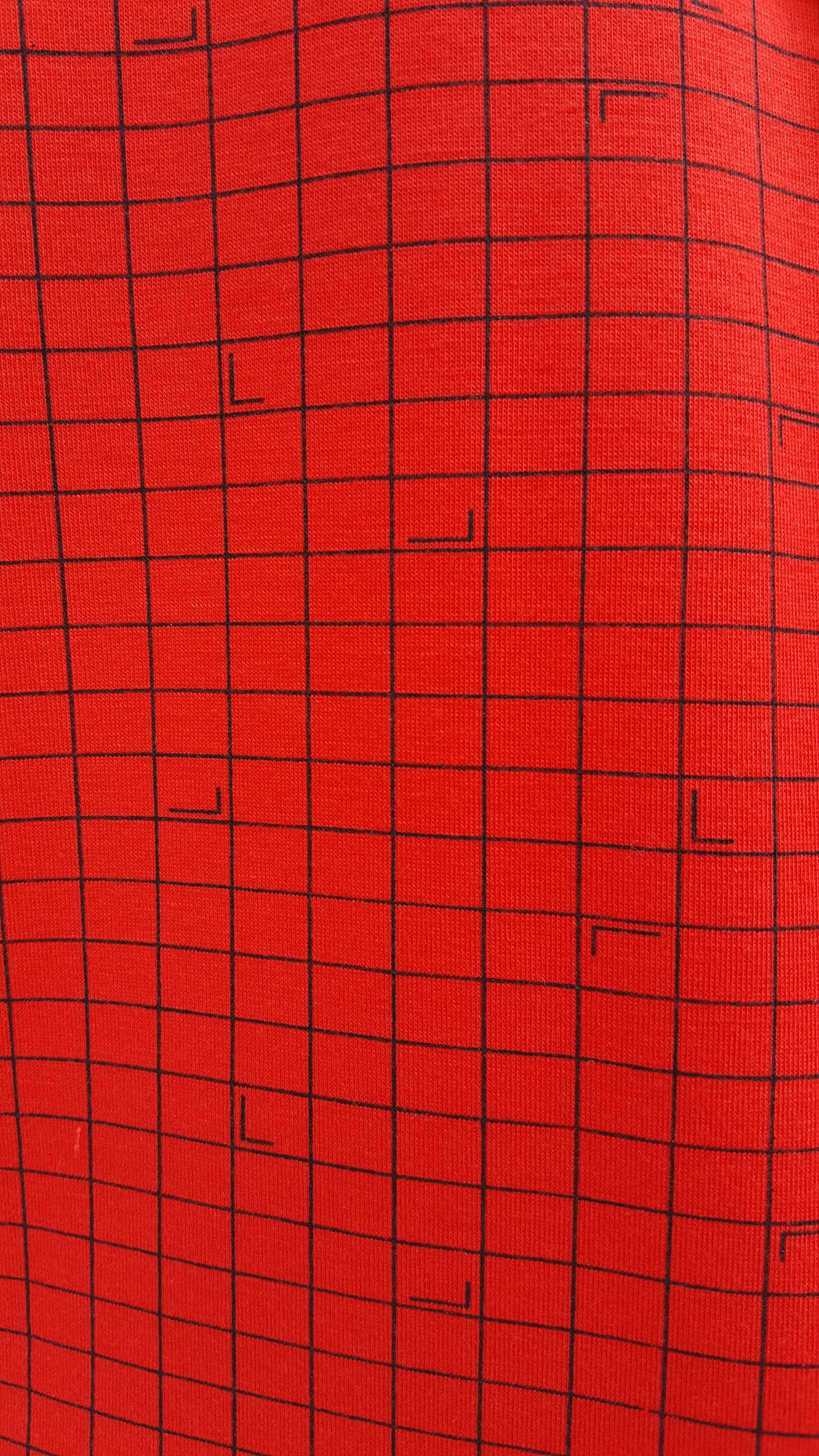 Close-up of digital print on white fabric showing fine detail and color accuracy