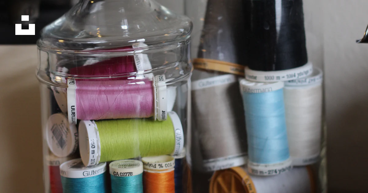 Two clear glass jars with threads photo – Free Fashion Image on Unsplash