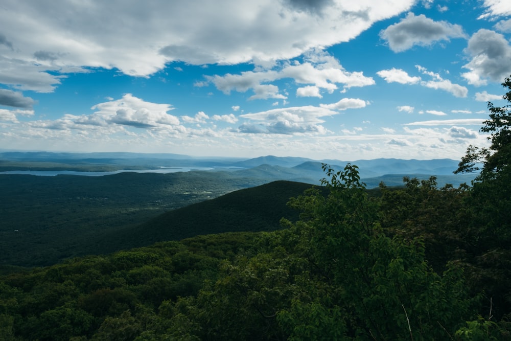 mountains under cloudy sky