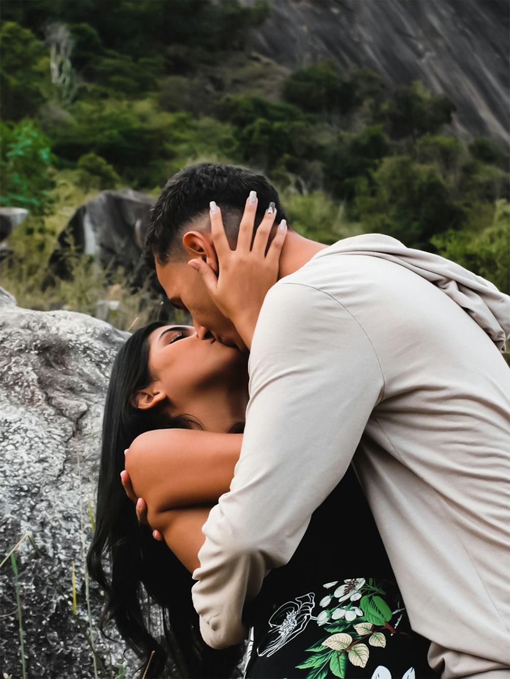 man and woman kissing