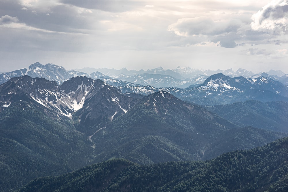 mountain view under white clouds during daytime