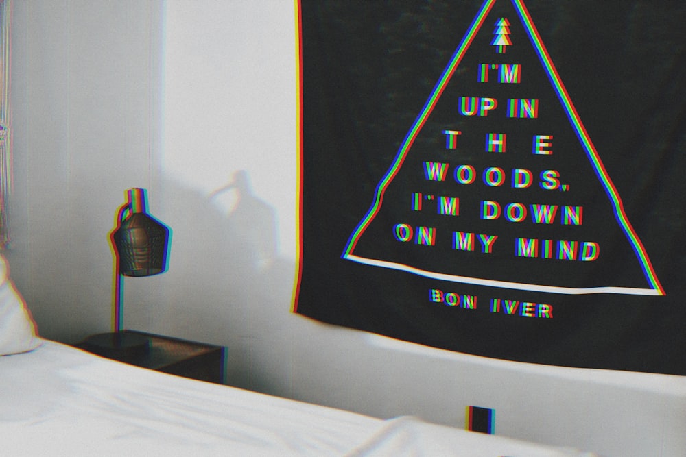 i'm up in the woods, i'm down in my mind text on black textile