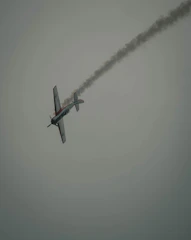 L39 Albatros performing a sharp maneuver at dusk.