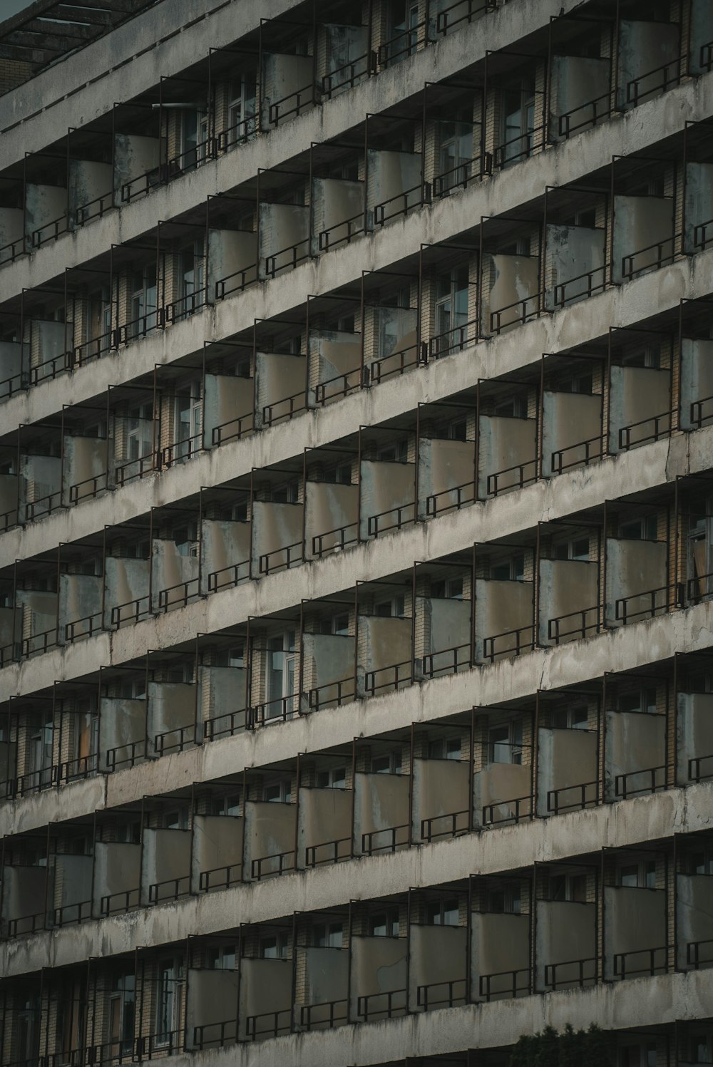 grey and brown high rise tenement building