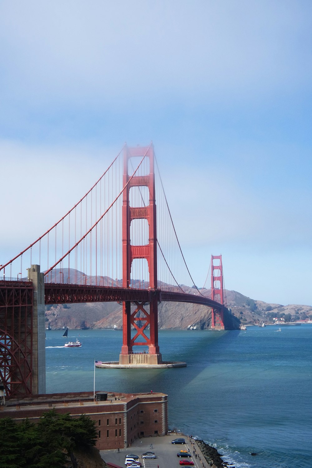 alcatraz bridge with fog during daytime