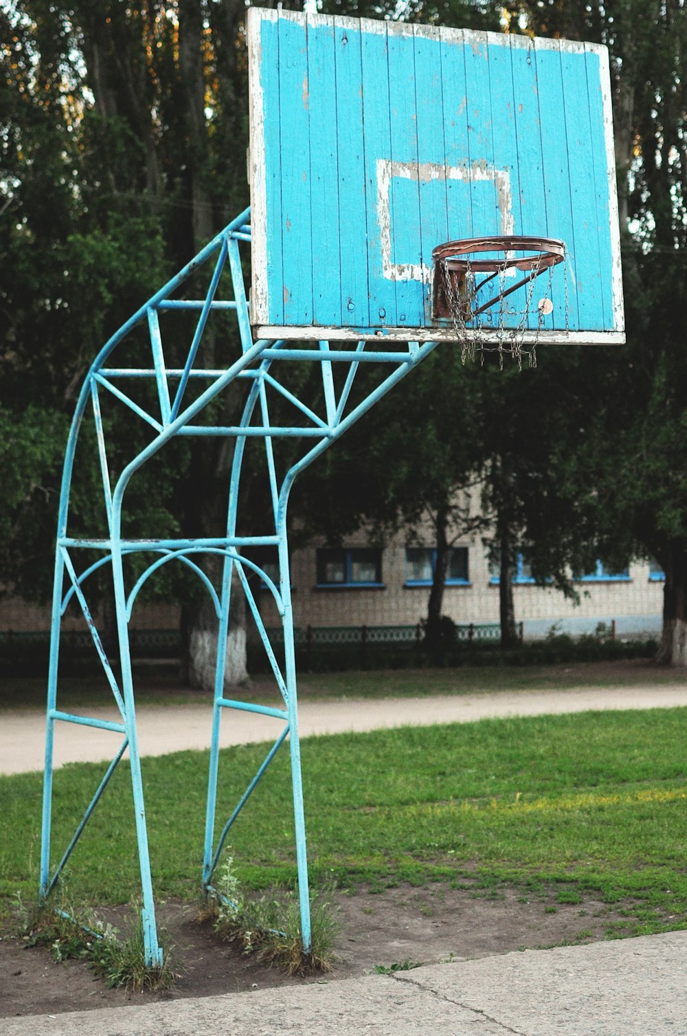 blue basketball hoop during daytime