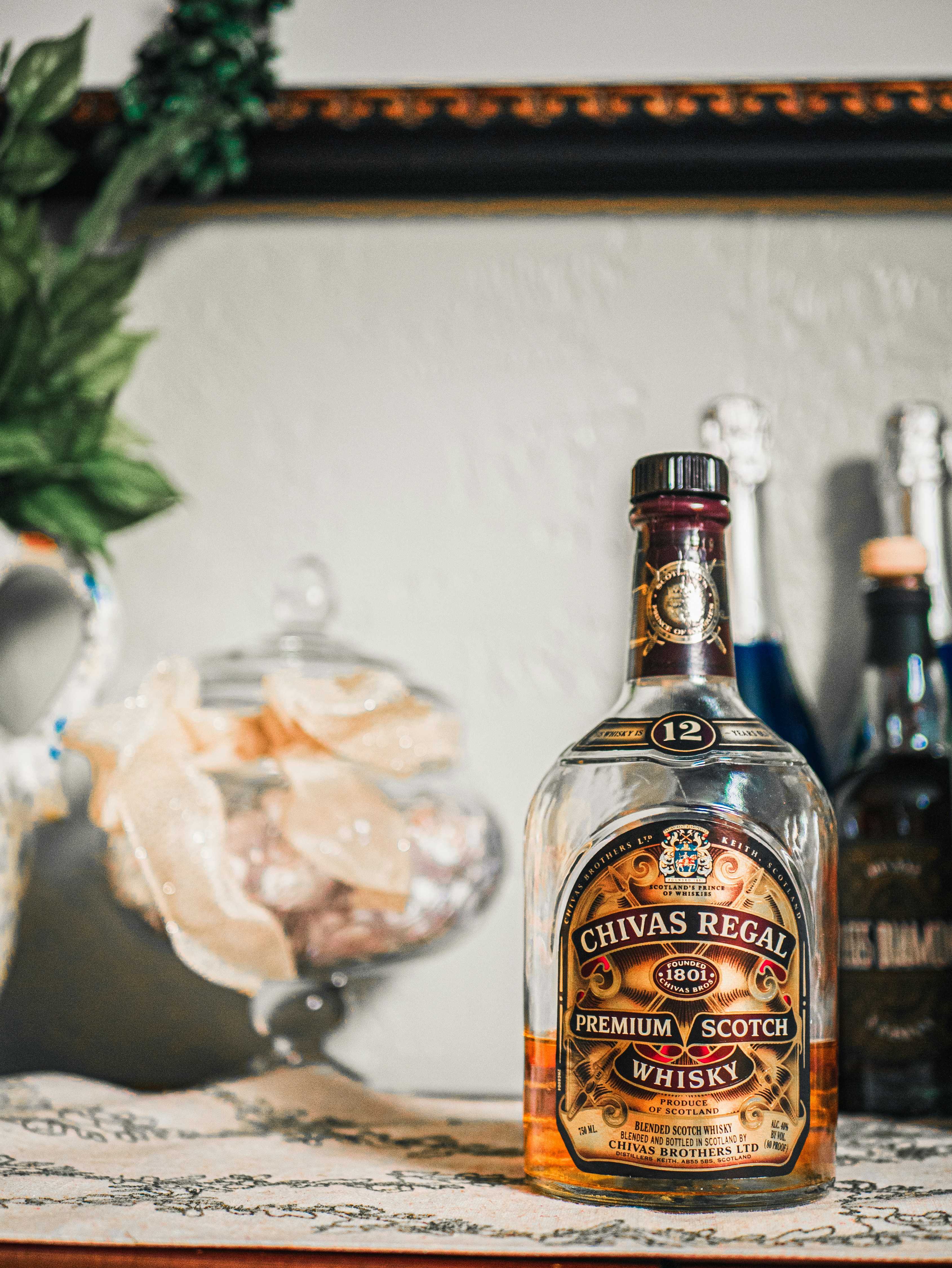 Shallow focus photography Chivas Regal whisky bottle photo – Free Food ...