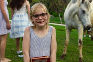 girl wearing black framed eyeglasses
