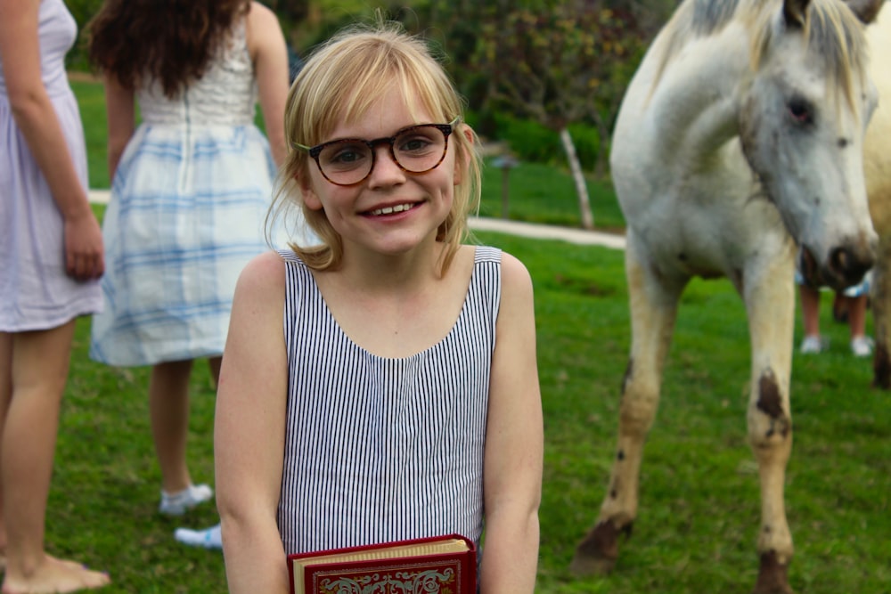 girl wearing black framed eyeglasses