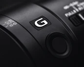Close-up of a camera lens symbolizing the artistic focus of our photographic partners.