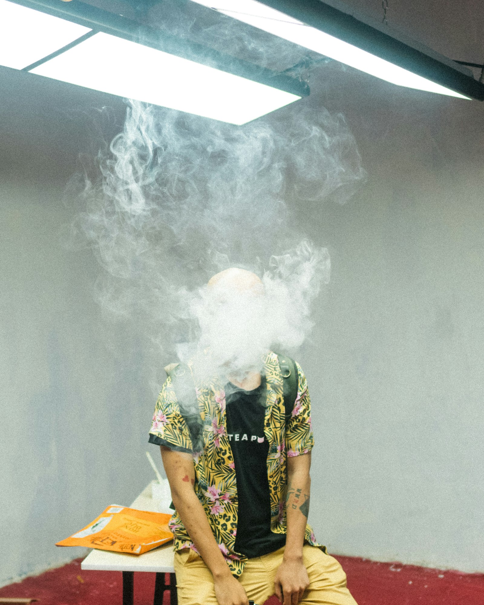 Sony a7R III + Sony FE 24mm F1.4 GM sample photo. Man doing vape tricks photography