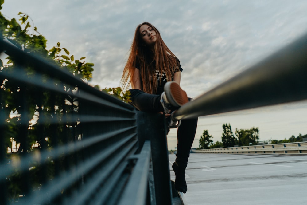 unknown person standing on handrail