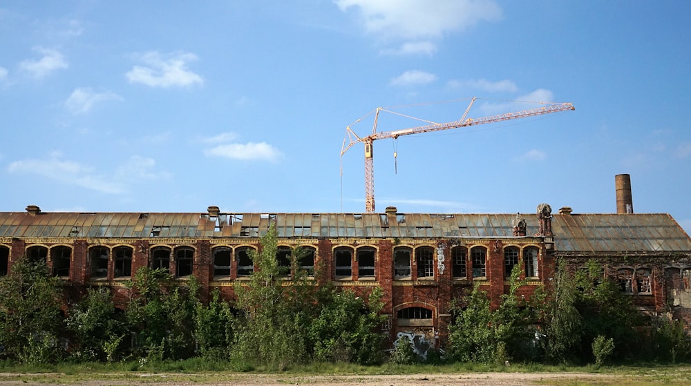 brown building near plants