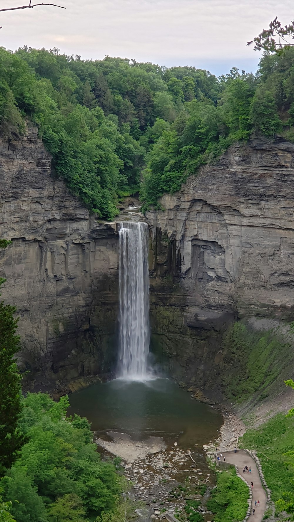 rock cliff with water fall