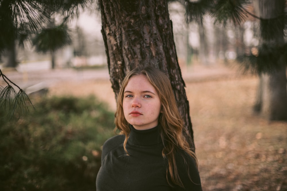 woman wearing black turtleneck top