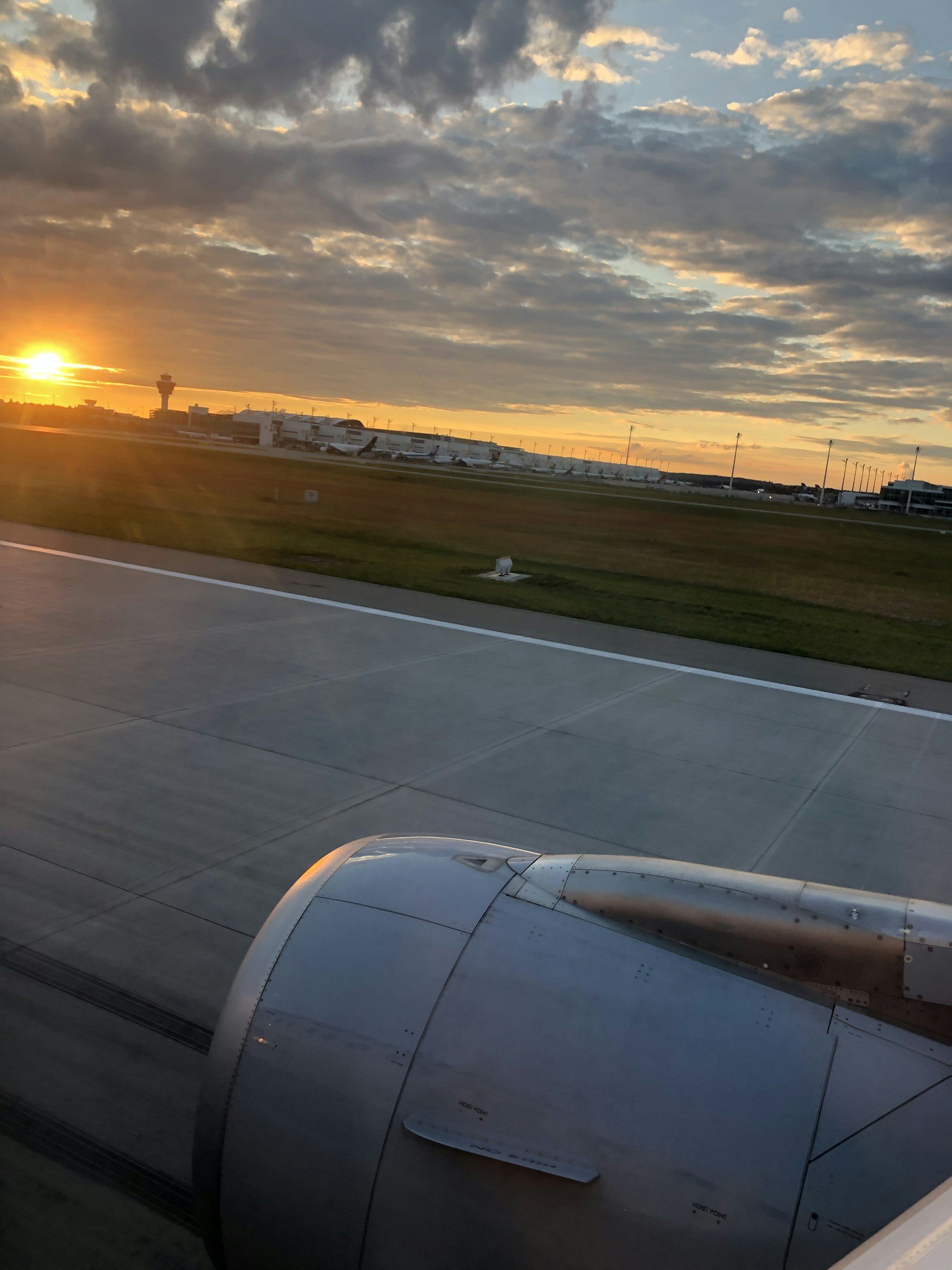 woman wearing yellow long-sleeved dress under white clouds and blue sky during daytime