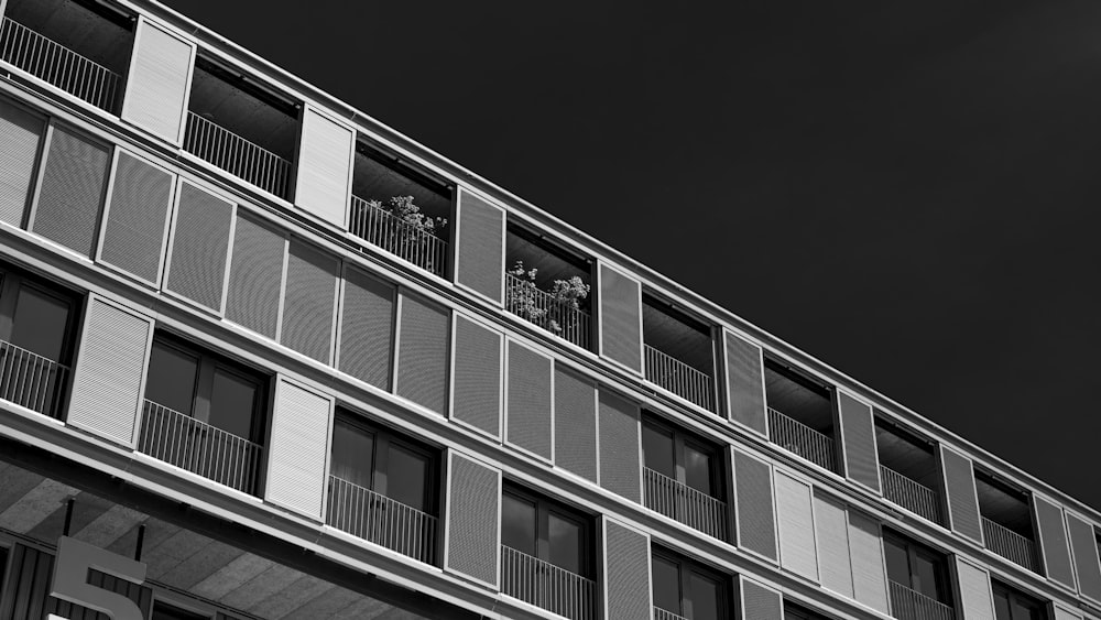 a black and white photo of a tall building