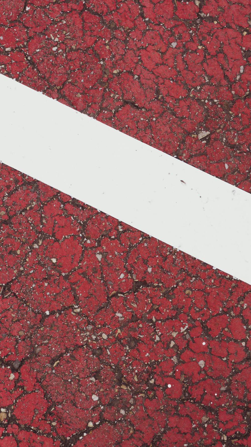 white and red marble tiles