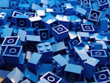 blue cube toy lot close-up photography