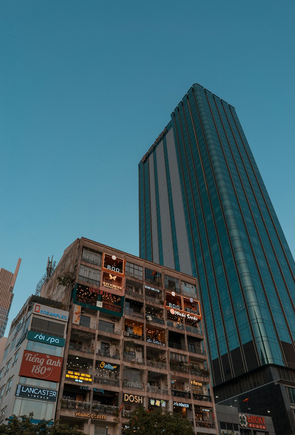 curtain wall building under blue sky