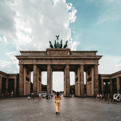 woman standing near building