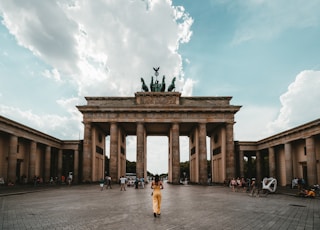 woman standing near building