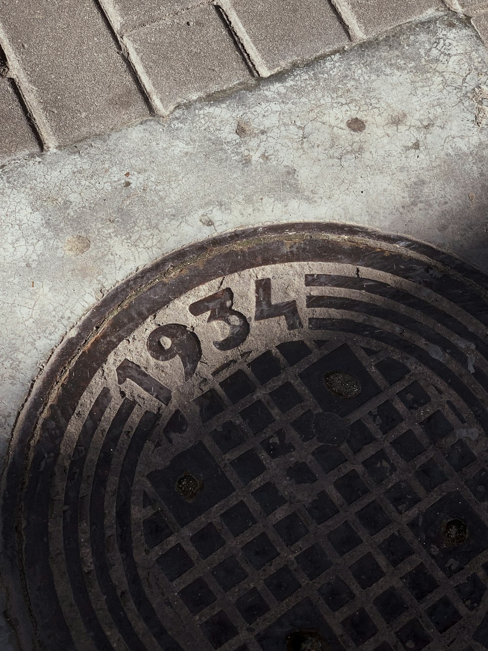 1934 manhole cover on floor
