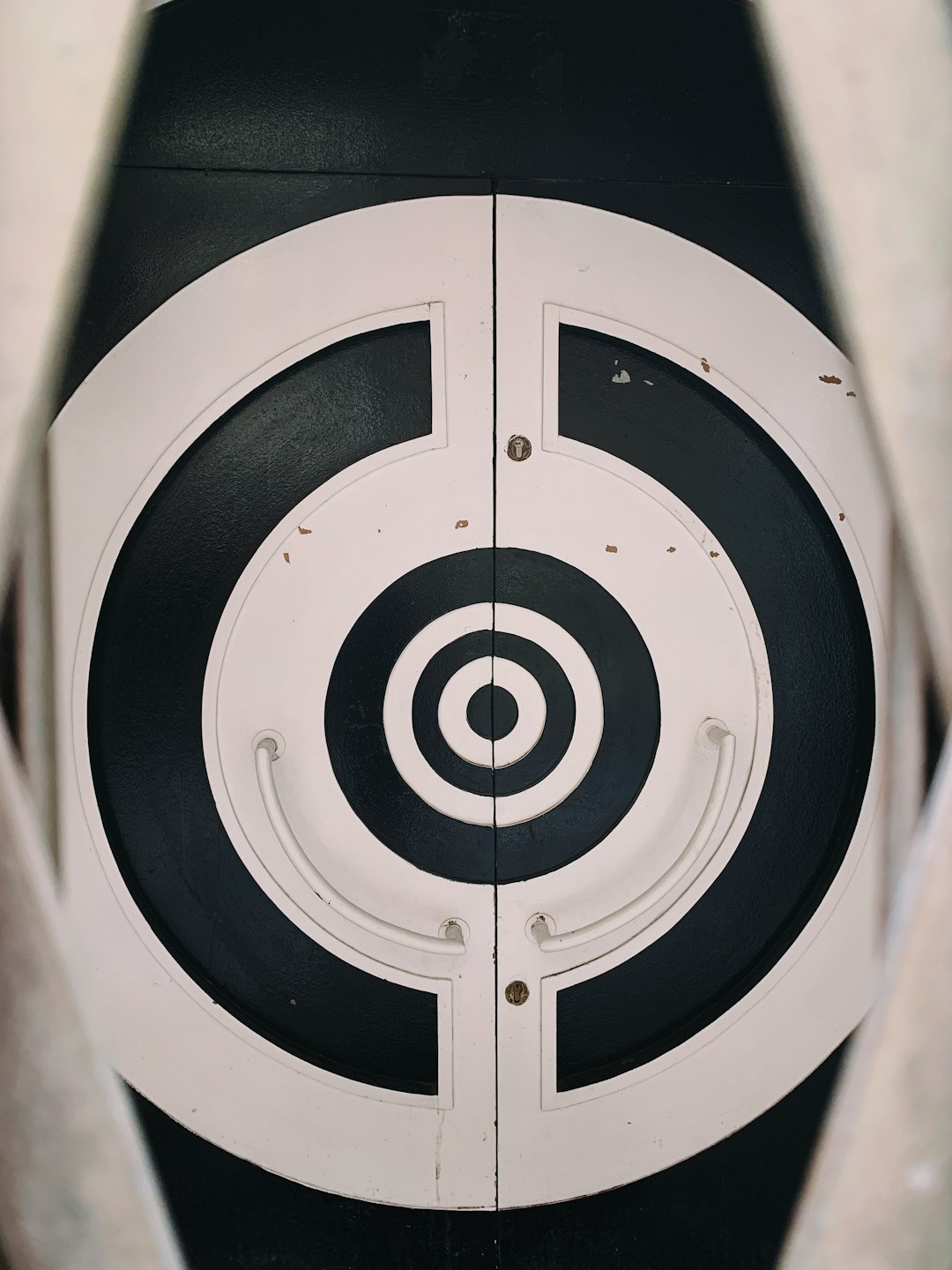 white and black bullseye target