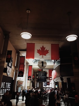 flag of Canada in room close-up photography