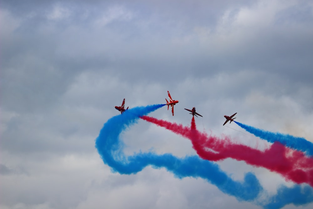 four planes performing in sky