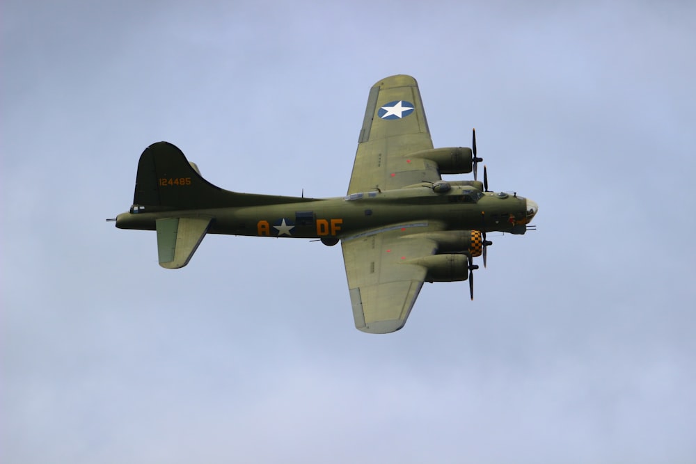 green classic military bomber plane