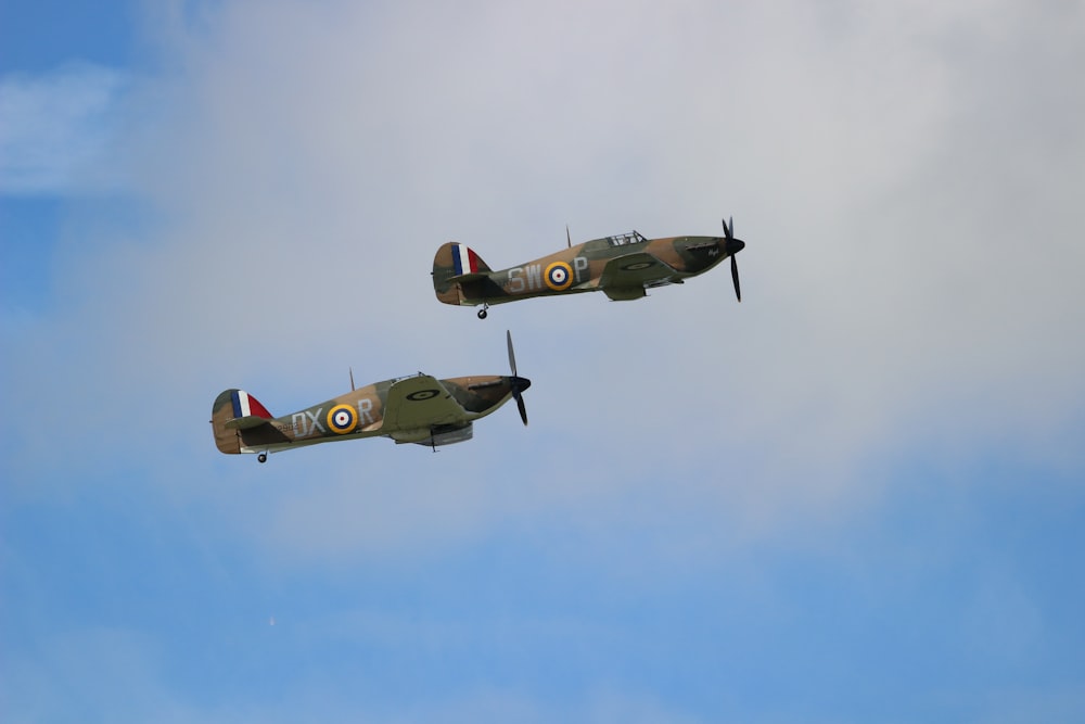 two biplanes in sky