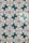 A series of ornate tiles with a repeating floral pattern featuring teal and black decorative motifs against a white background. Each tile displays a symmetrical design, creating a uniform look across the entire surface.