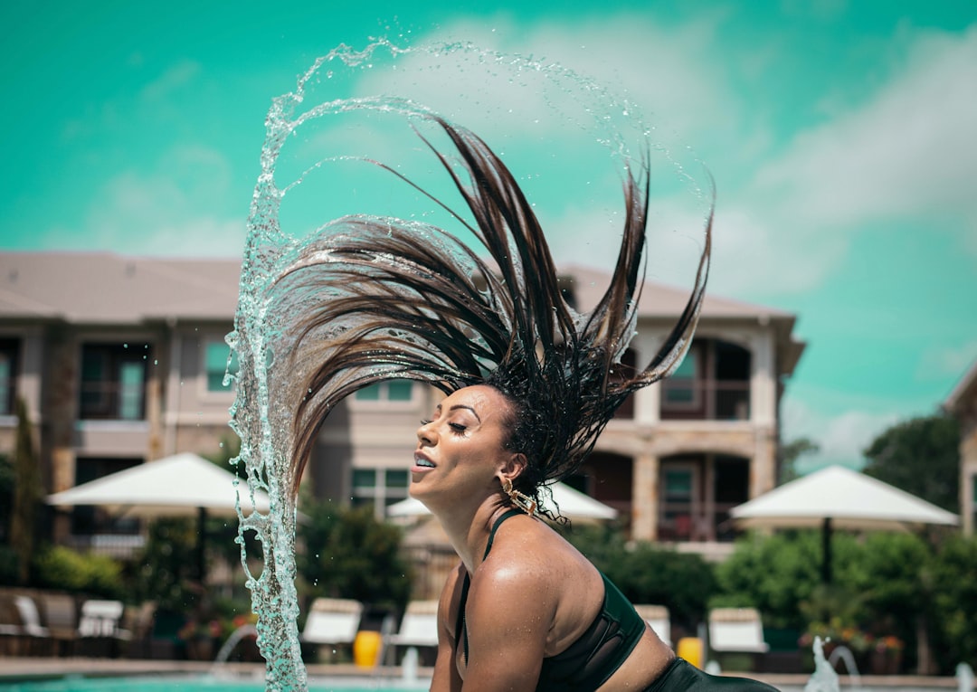 woman splashing her hair