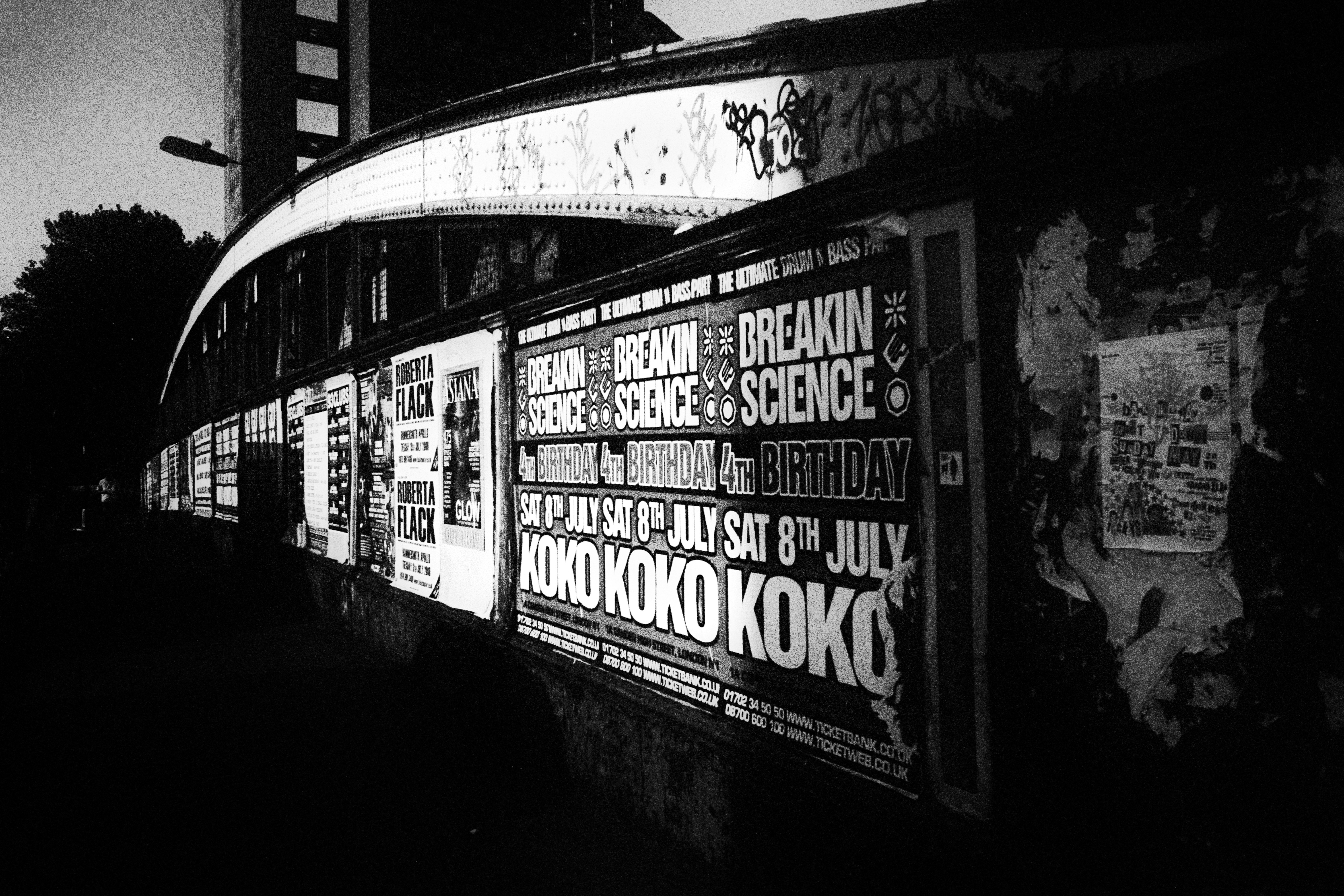 grayscale photo of wall with paint