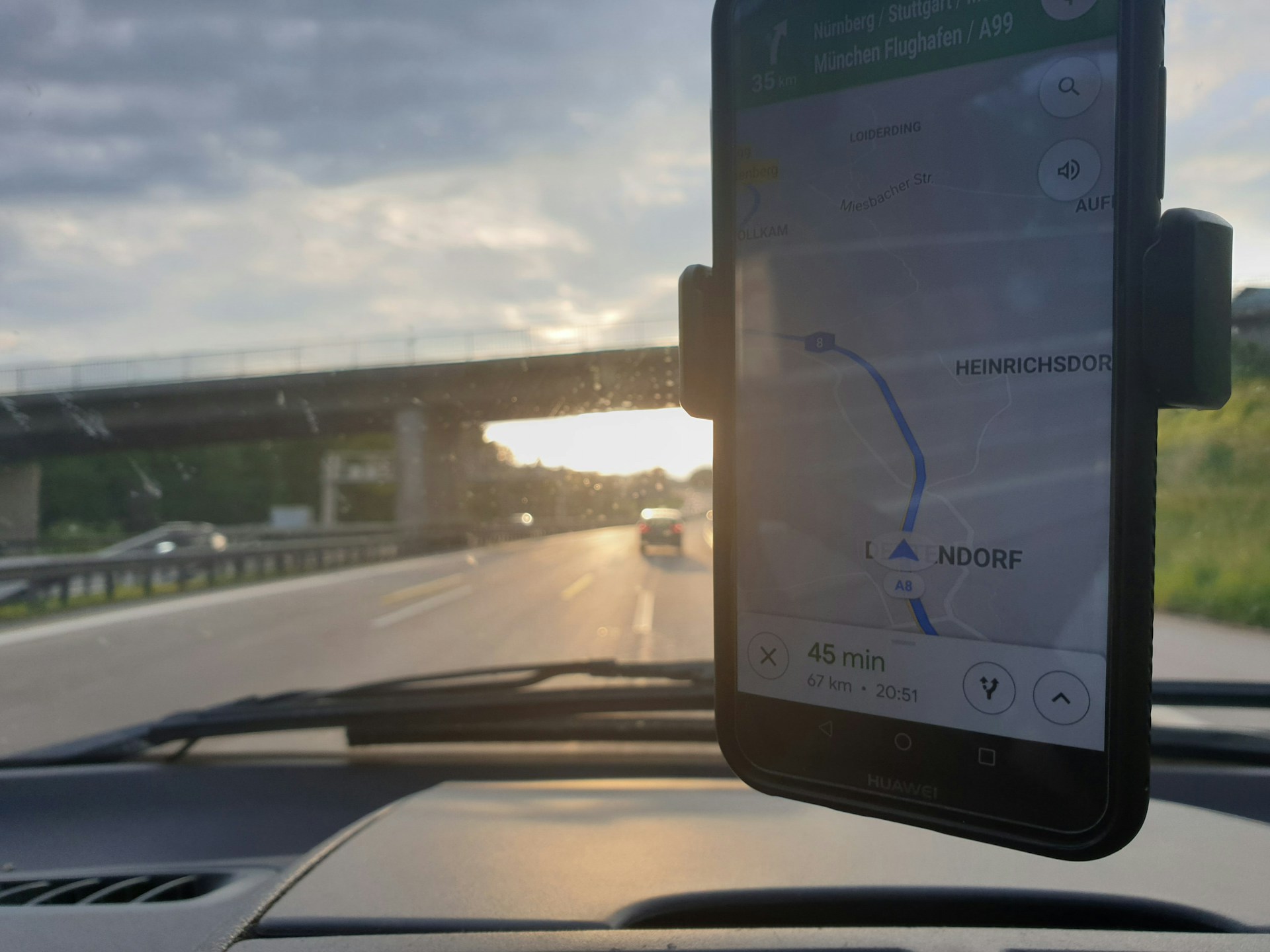 woman wearing yellow long-sleeved dress under white clouds and blue sky during daytime