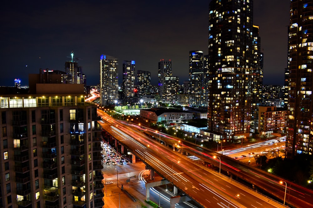 time lapse photography of cars passing on bridge