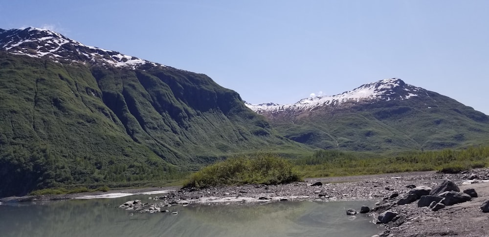 mountains and river during day