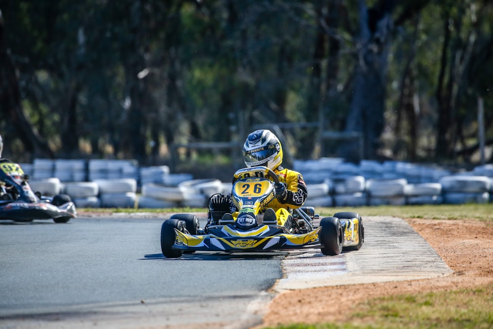 man riding on formula 1