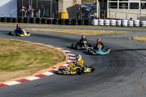men riding on go kart