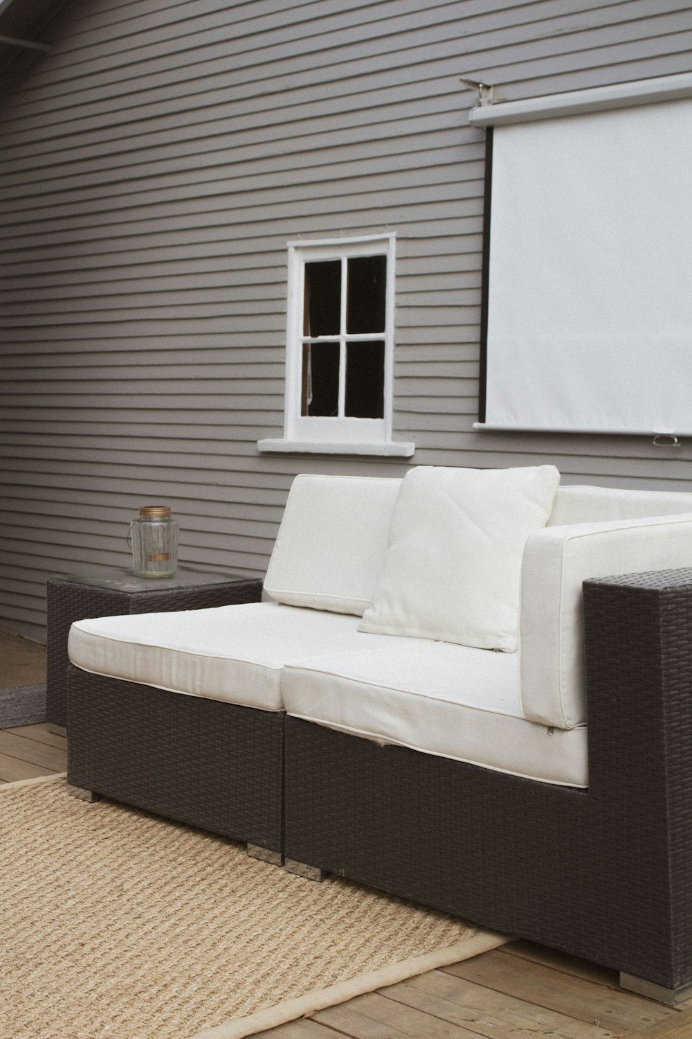 vacant white and brown sectional sofa in room