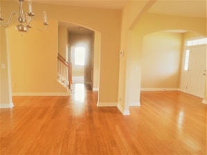A bright and inviting room with freshly painted walls in soft colors.