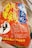 The image contains a package with vibrant red and blue labeling featuring Chinese characters. The package includes an image of a rooster, suggesting it contains poultry or is related to chicken products. The text appears to be informative, likely describing the product or brand.