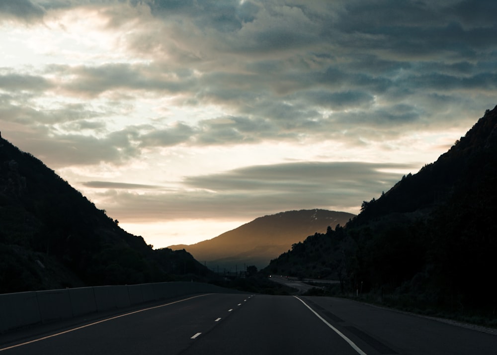 silhouette photography of mountain during golden hour