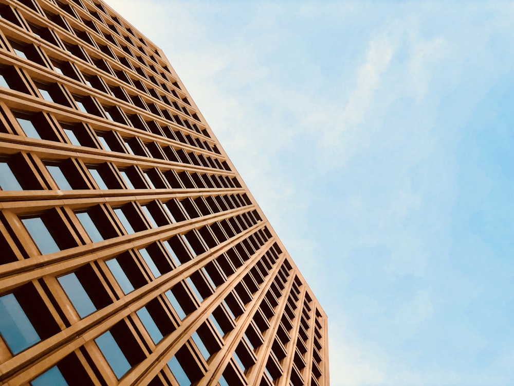 low angle photo of brown high rise building